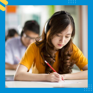 a woman wearing headphones writing on paper